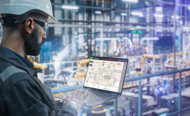 Emerson-movicon-on-laptop